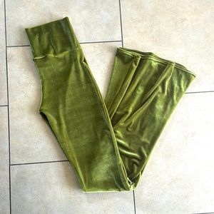 Green velvet flared leggings